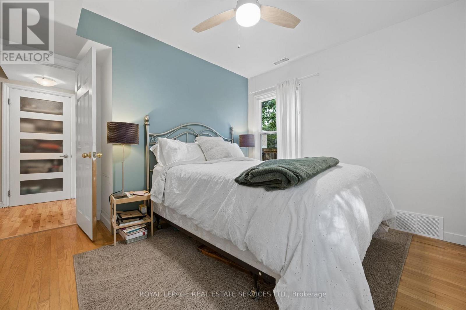 Second Bedroom with Oak Strip Hardwood Flooring - 46 Germorda Drive, Oakville, ON