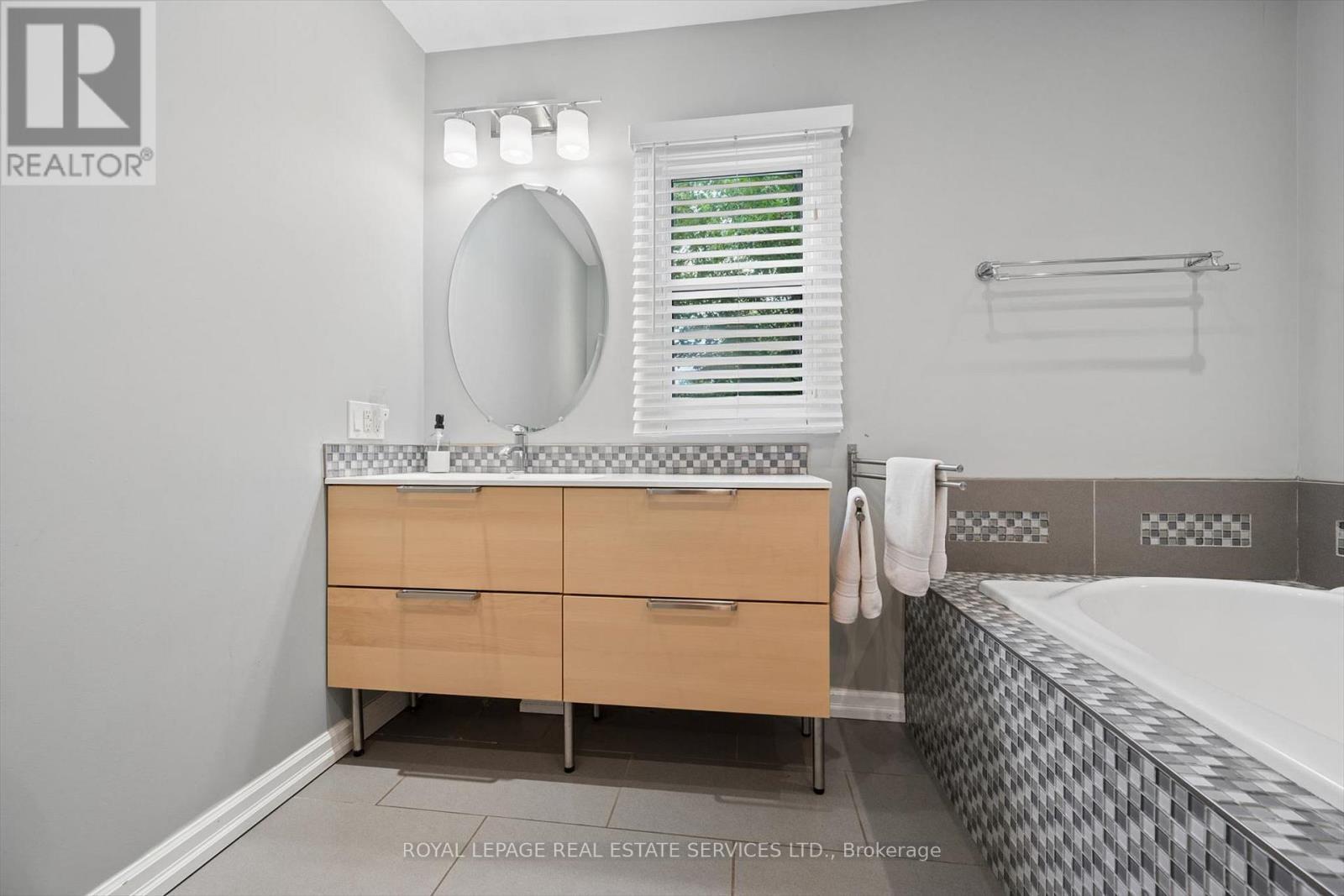 Spa-Inspired Three-Piece Bathroom with Jacuzzi Tub - 46 Germorda Drive, Oakville, ON