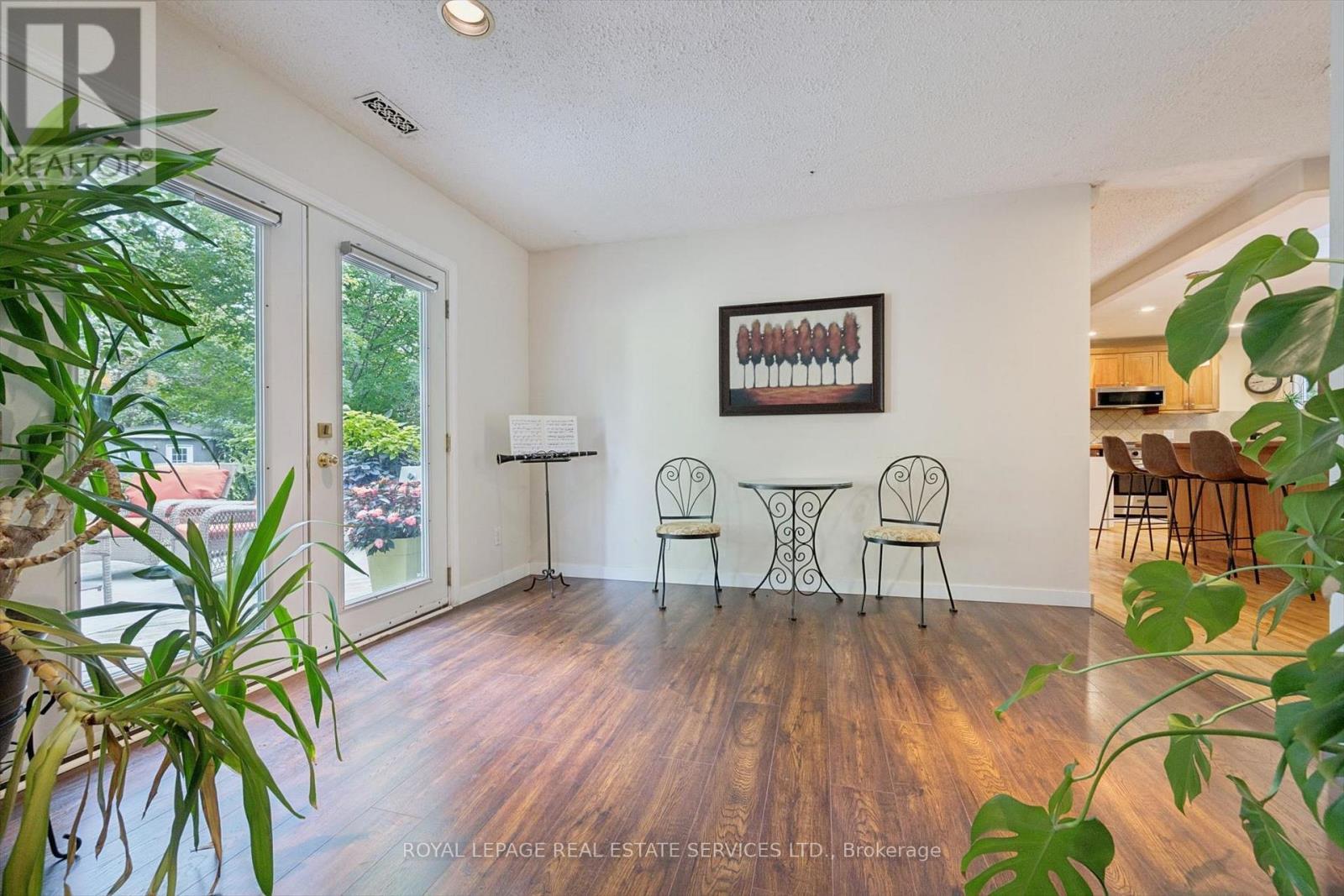 Living Room with a French Door Walkout to Deck - 46 Germorda Drive, Oakville, ON
