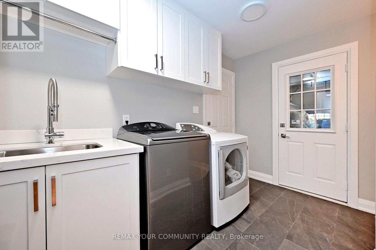 Laundry Room - Main Level-Access to Garage - 1530 Canada Court, Oakville, ON