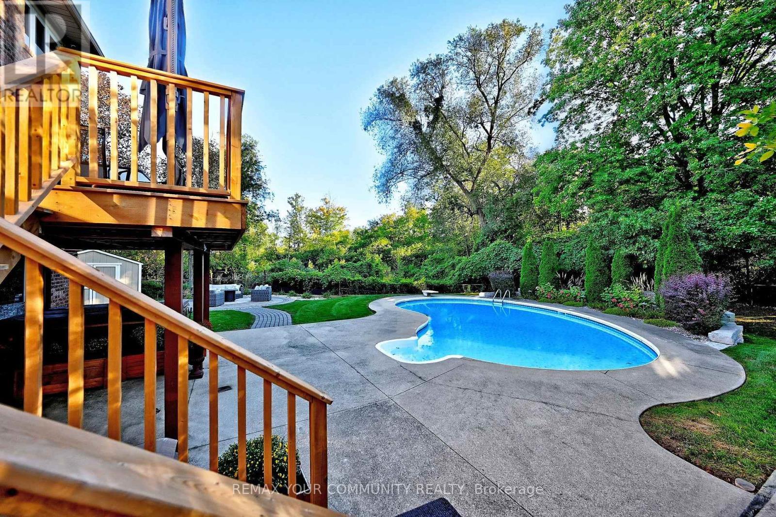 Stairs down from Kitchen to Yard - 1530 Canada Court, Oakville, ON