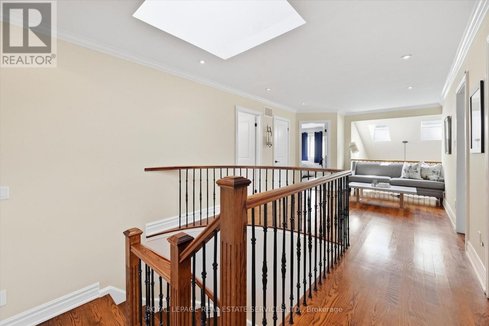 Skylight and Oak Hardwood Flooring in Upper Hall - 340 Oakridge Court, Oakville, ON