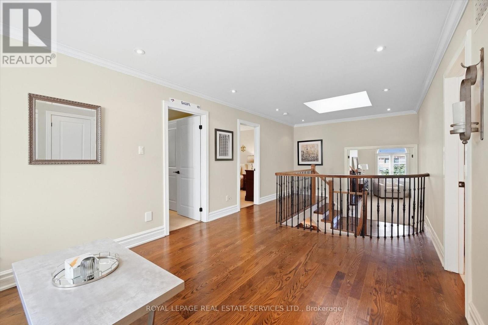 Skylight and Oak Hardwood Flooring in Upper Hall - 340 Oakridge Court, Oakville, ON