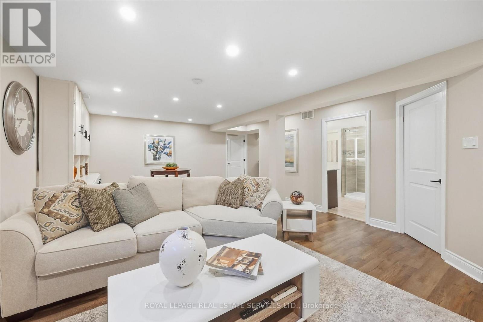 Large Recreation Room with an Electric Fireplace - 340 Oakridge Court, Oakville, ON