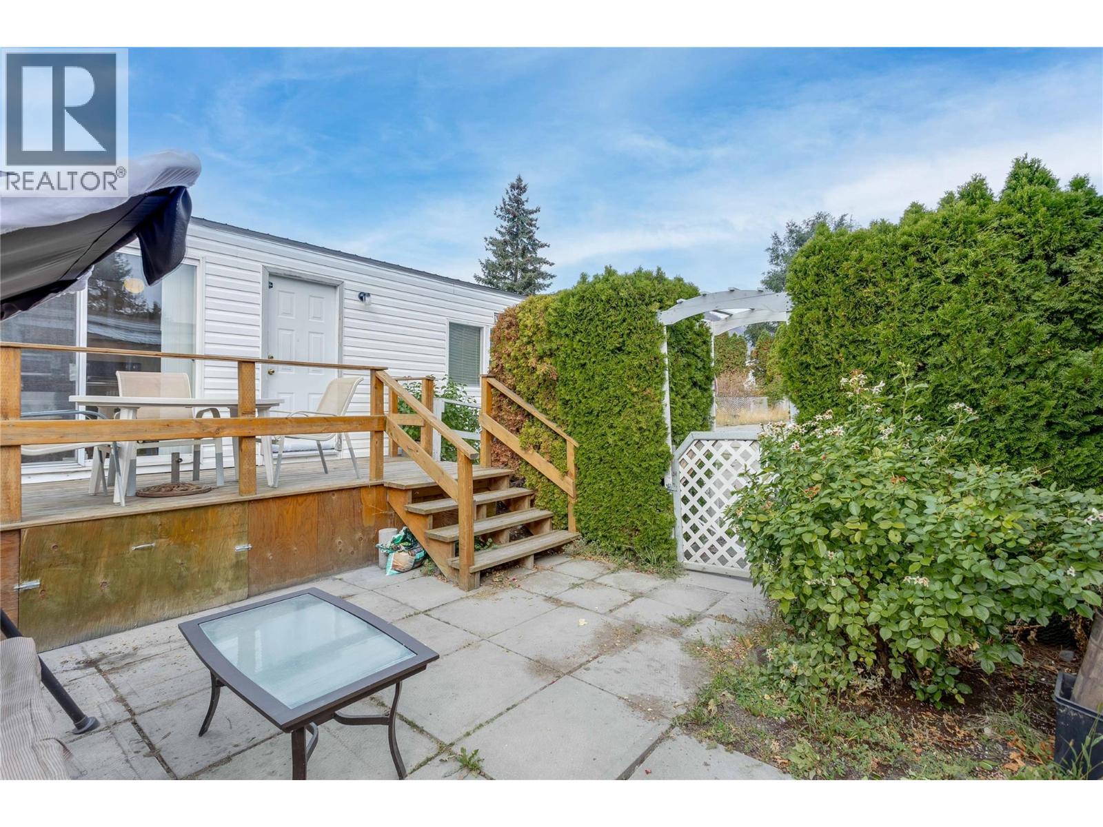 Patio and backyard space - 1699 Ross Road Unit# 213, West Kelowna, BC