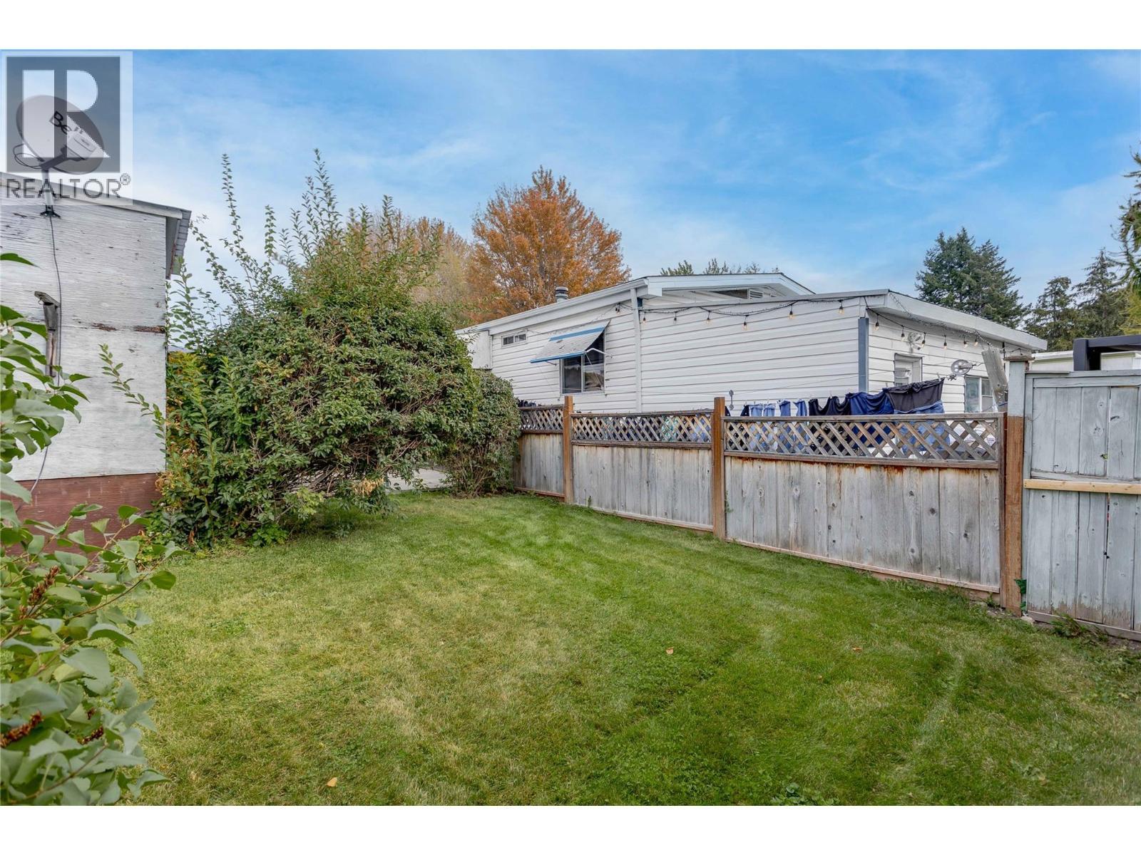 Green space for pets or kids! - 1699 Ross Road Unit# 213, West Kelowna, BC