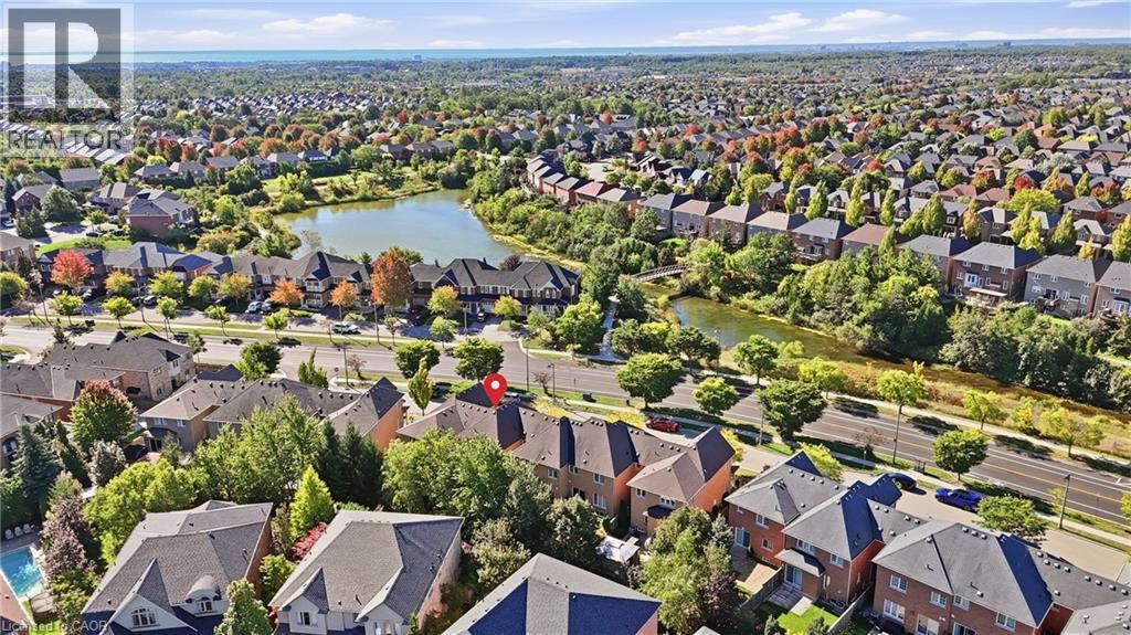 Aerial perspective showcasing a residential area with varied housing styles - 2409 Postmaster Drive, Oakville, ON