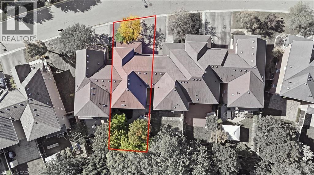 Multi-level roofline with dormer windows - 2409 Postmaster Drive, Oakville, ON