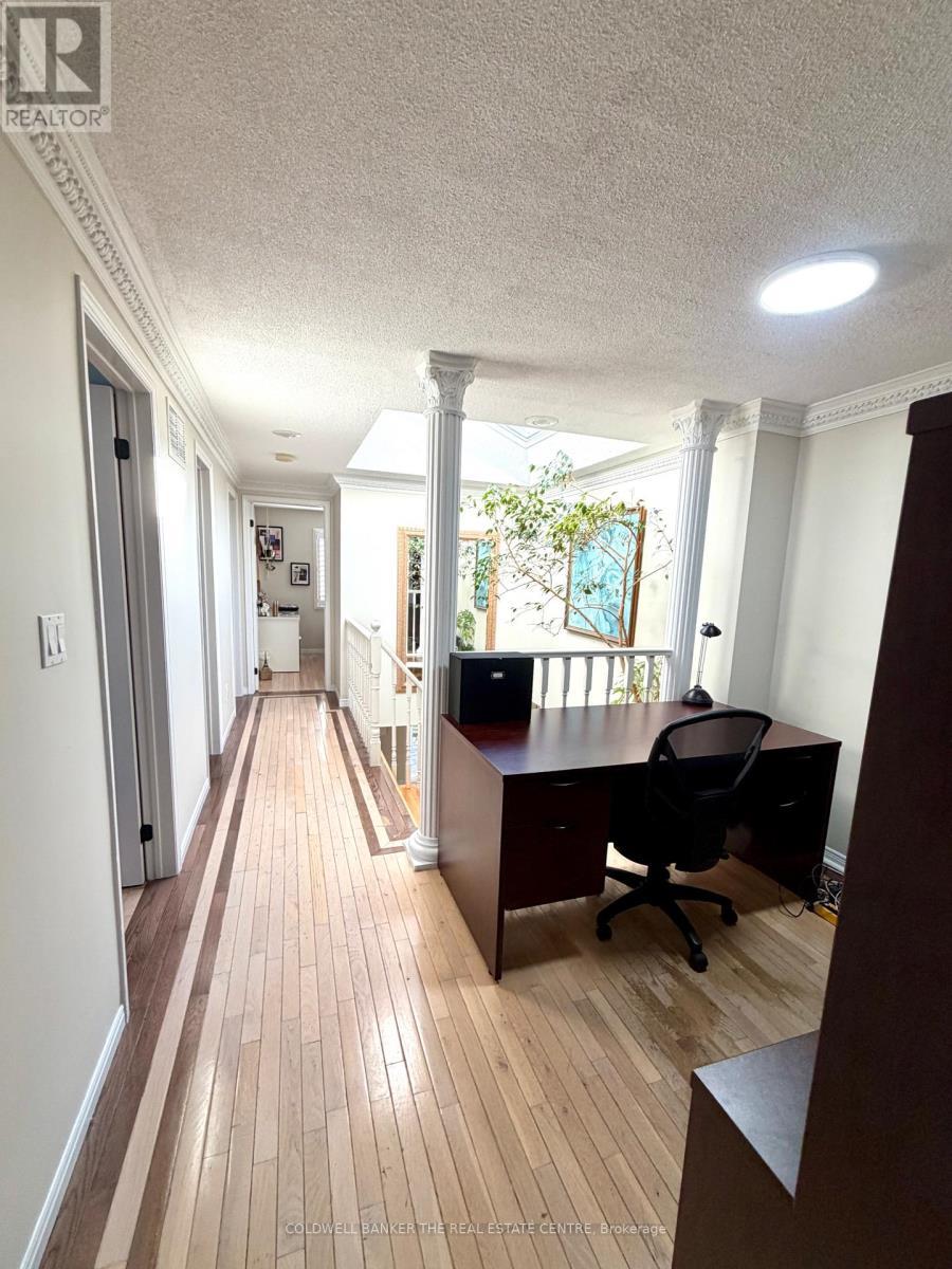 Hallway and Den - 227 Hickling Trail, Barrie, ON