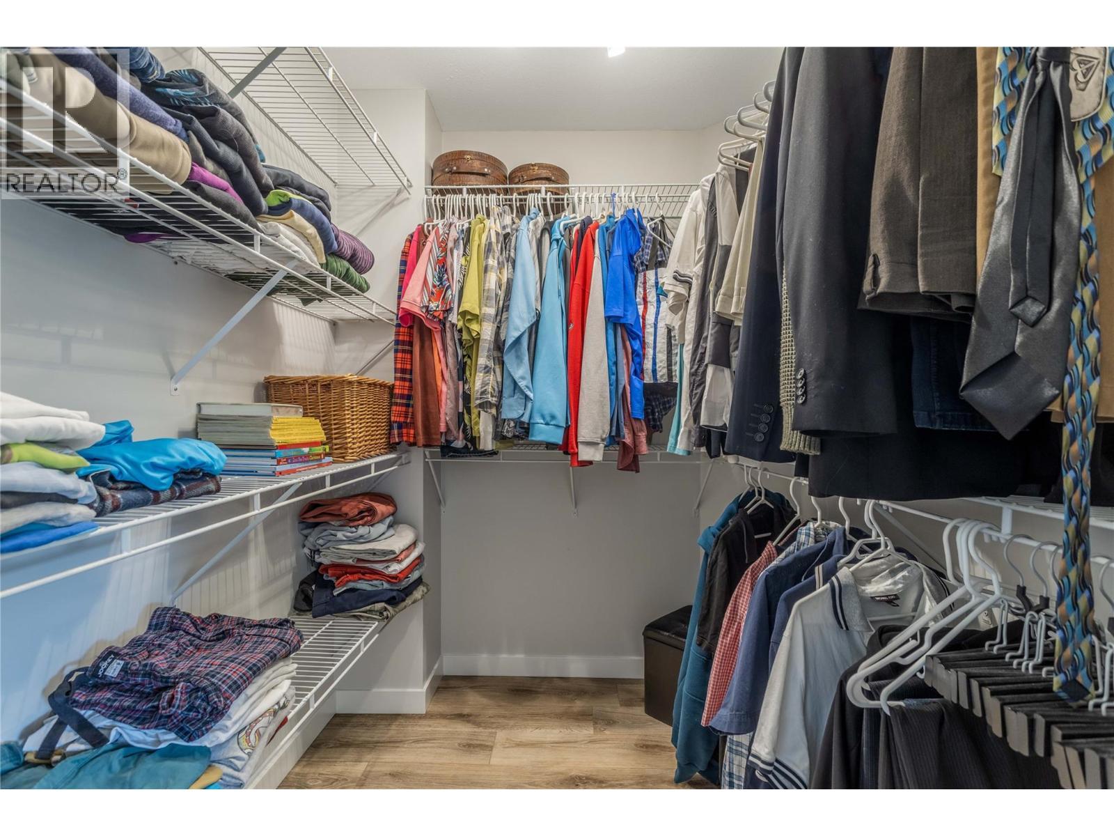 Each bedroom upstairs has a walking closet - 4325 Takla Road, Kelowna, BC