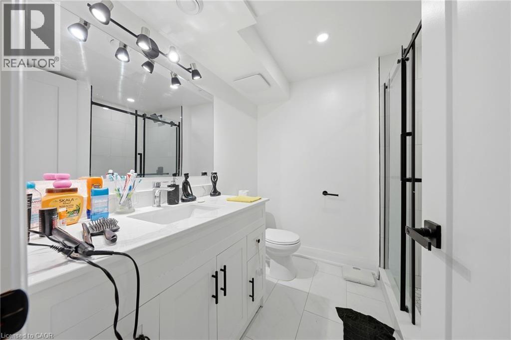 Lower level modern bathroom renovation - 3 Manley Crescent, Thorold, ON