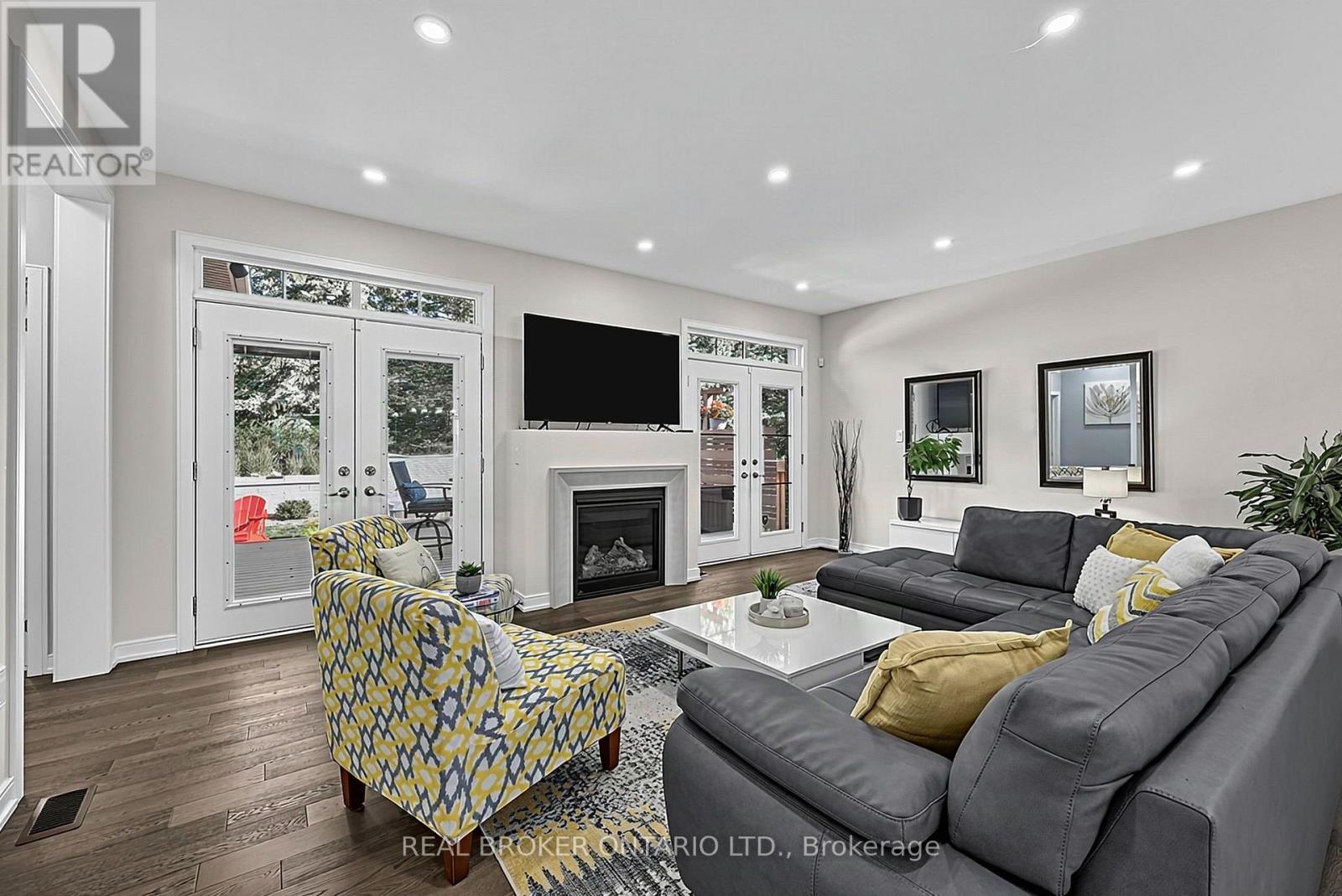 Living Area with Gas Fireplace - 20 Birkdale Place, Newmarket, ON