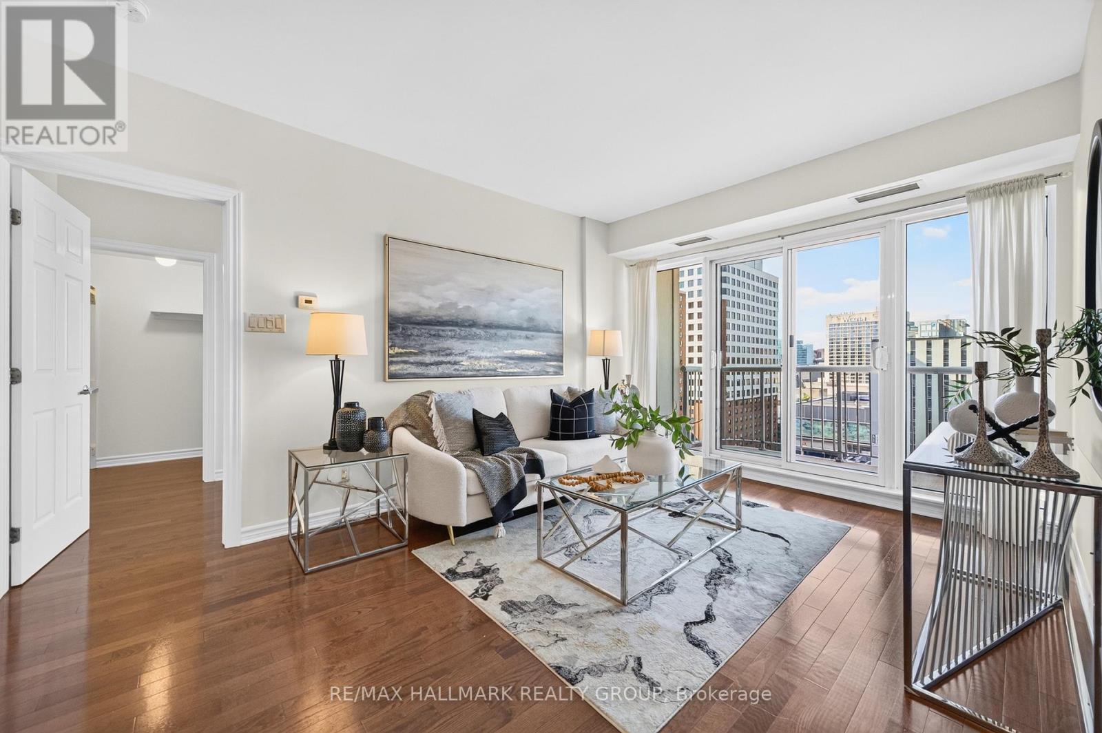 Living room with balcony views 1 - 1405 - 200 Rideau Street, Ottawa, ON