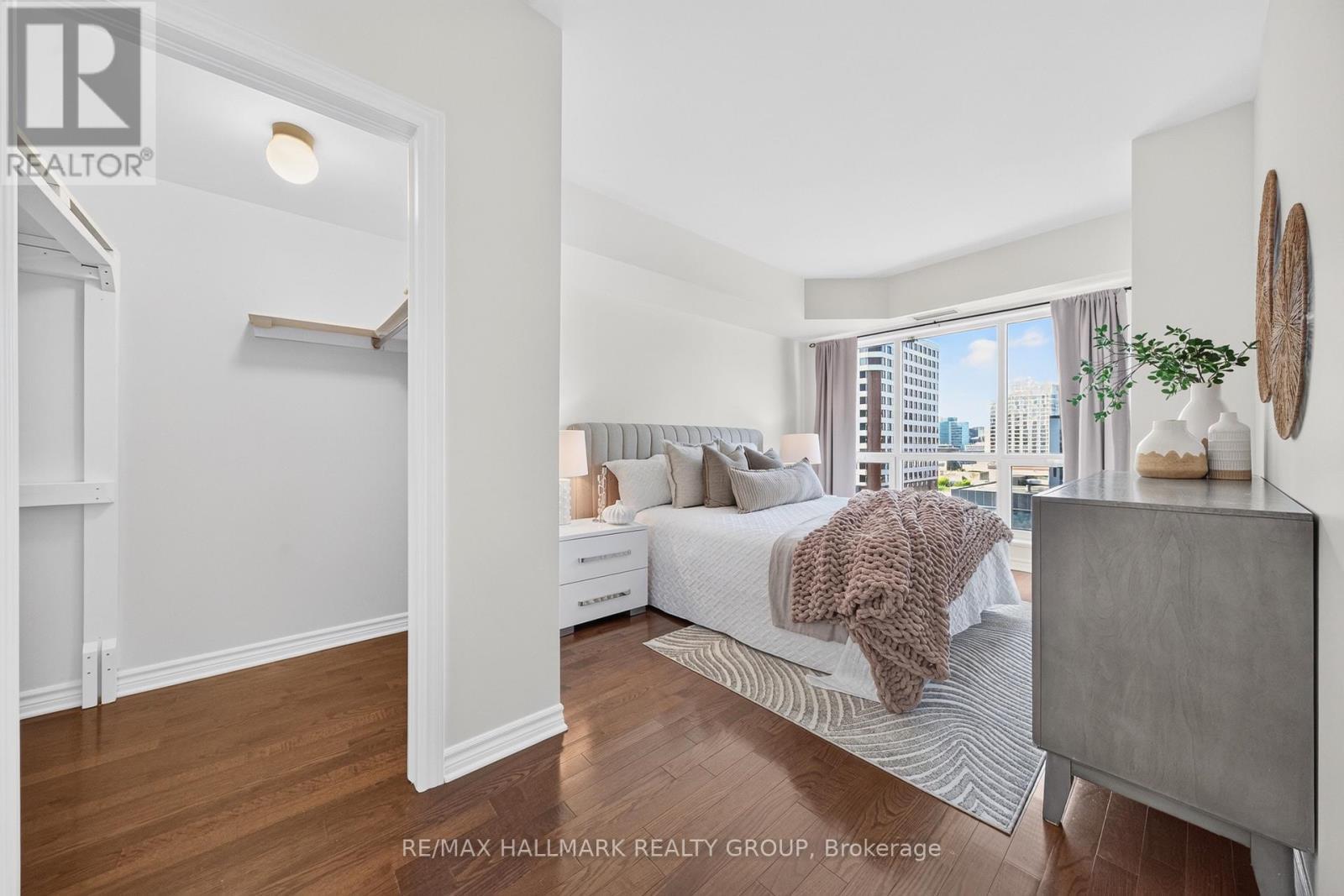 Primary bedroom and walk-in closet - 1405 - 200 Rideau Street, Ottawa, ON