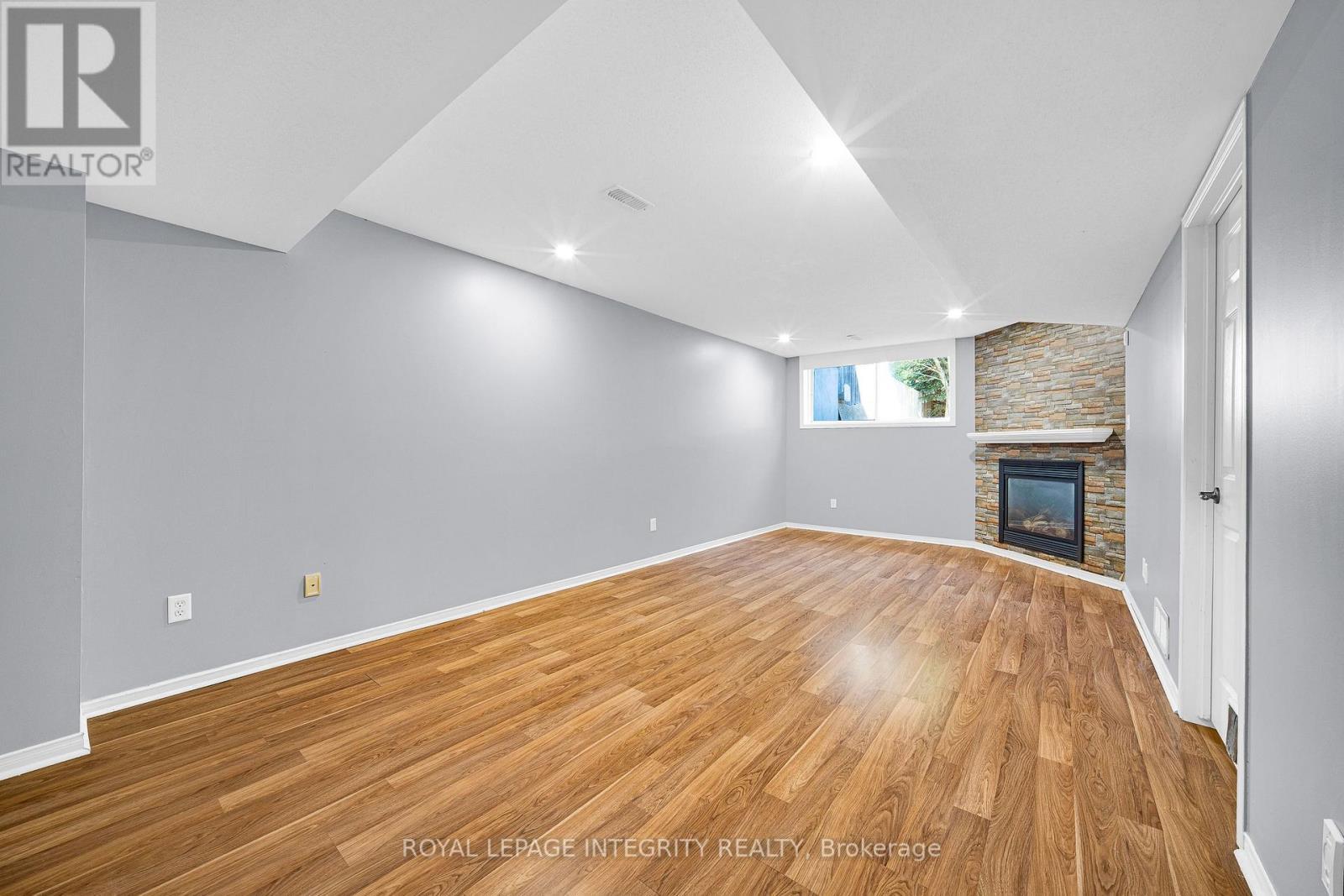 Finished basement with gas fireplace - 170 Flamborough Way, Ottawa, ON