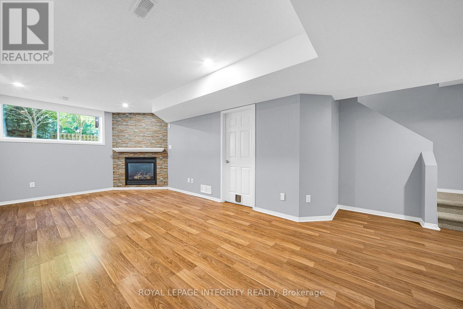 Finished basement with gas fireplace - 170 Flamborough Way, Ottawa, ON