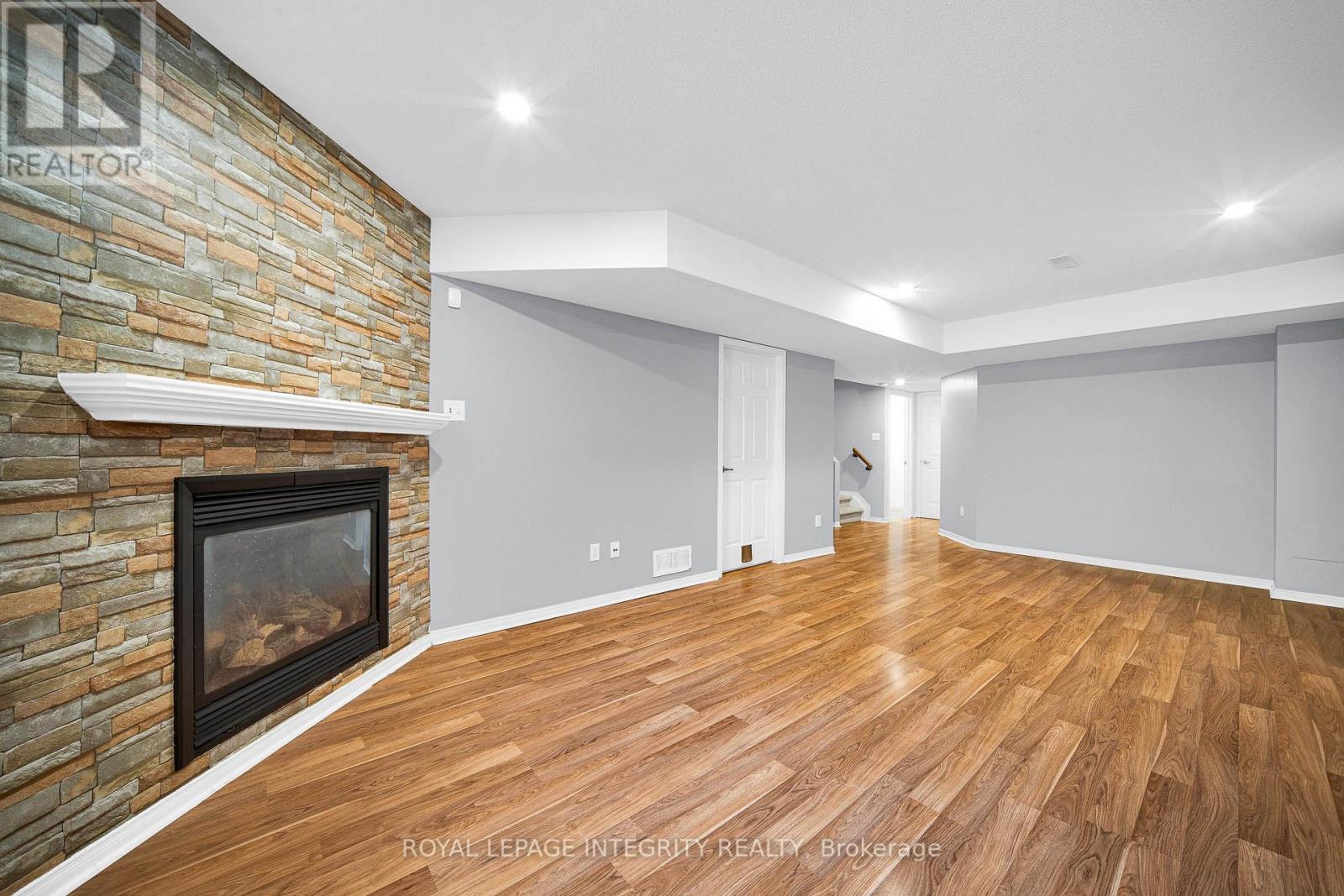 Finished basement with gas fireplace - 170 Flamborough Way, Ottawa, ON