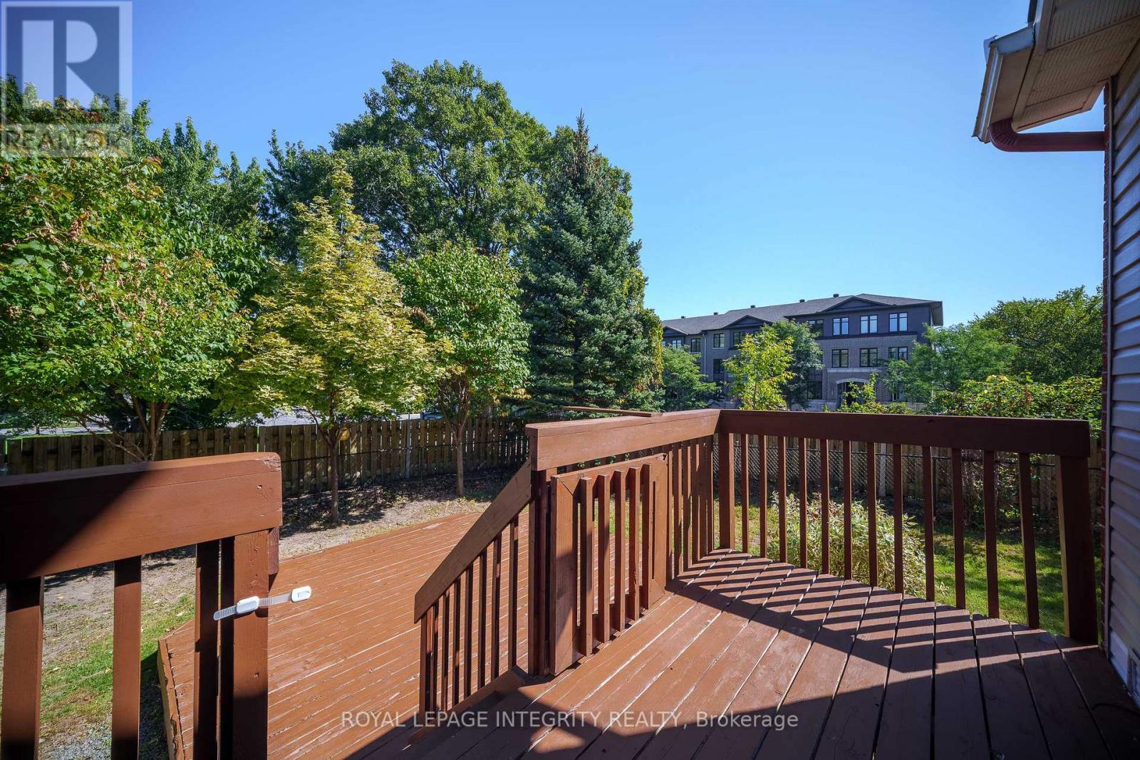 Large two-tier deck and fenced backyard - 170 Flamborough Way, Ottawa, ON