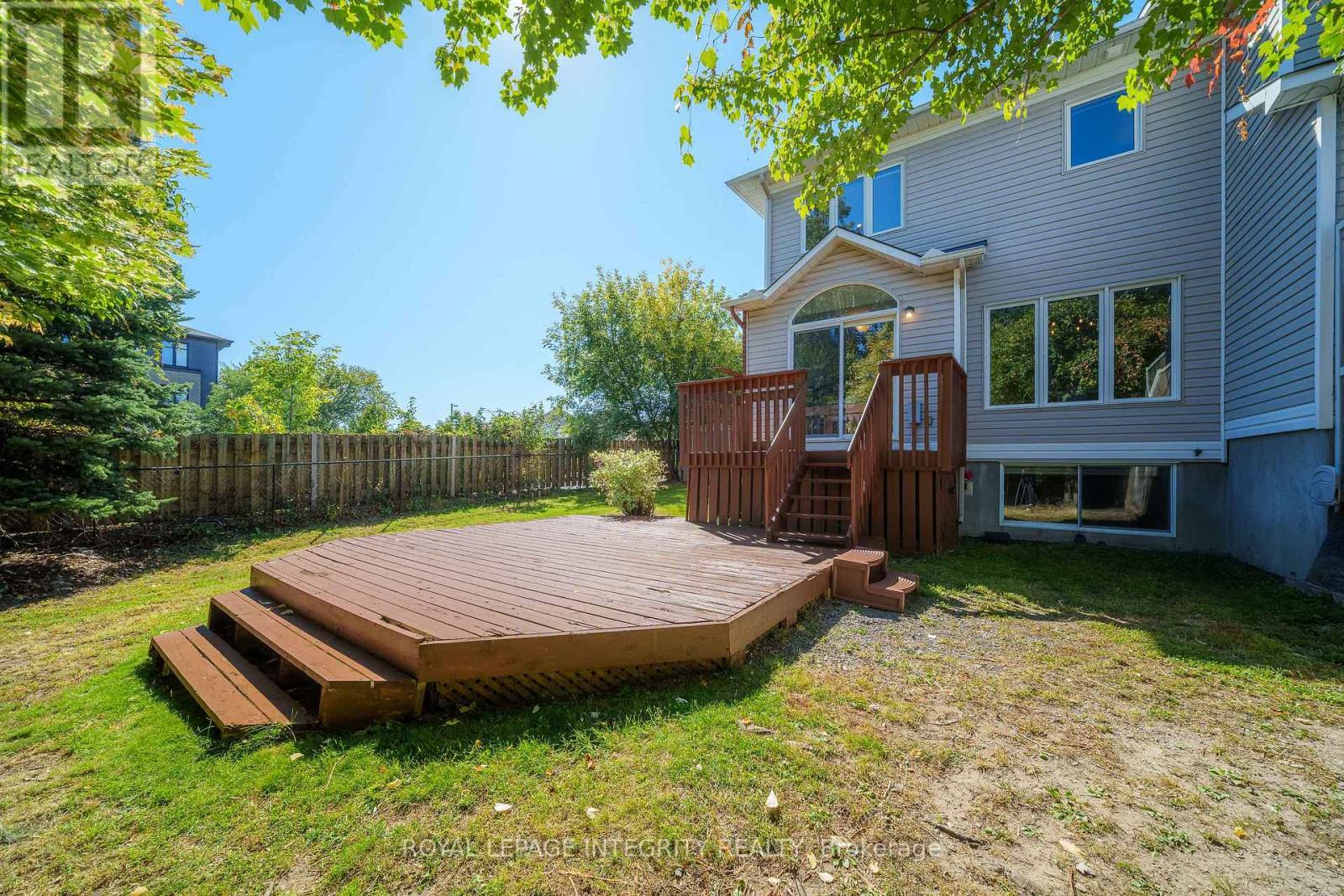 Large two-tier deck and fenced backyard - 170 Flamborough Way, Ottawa, ON