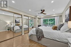 Primary Bedroom with His & Her Closets -
