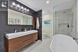 Main Bath with Soaker Tub, Shower & Double Sinks -