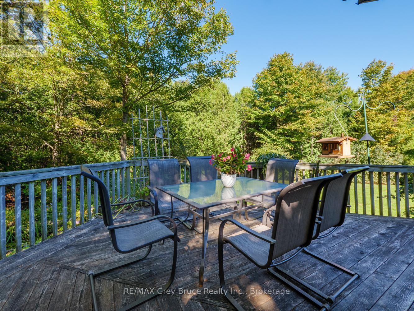 Views of the pond, fire pit and mature gardens - 135 North Diagonal, South Bruce Peninsula, ON