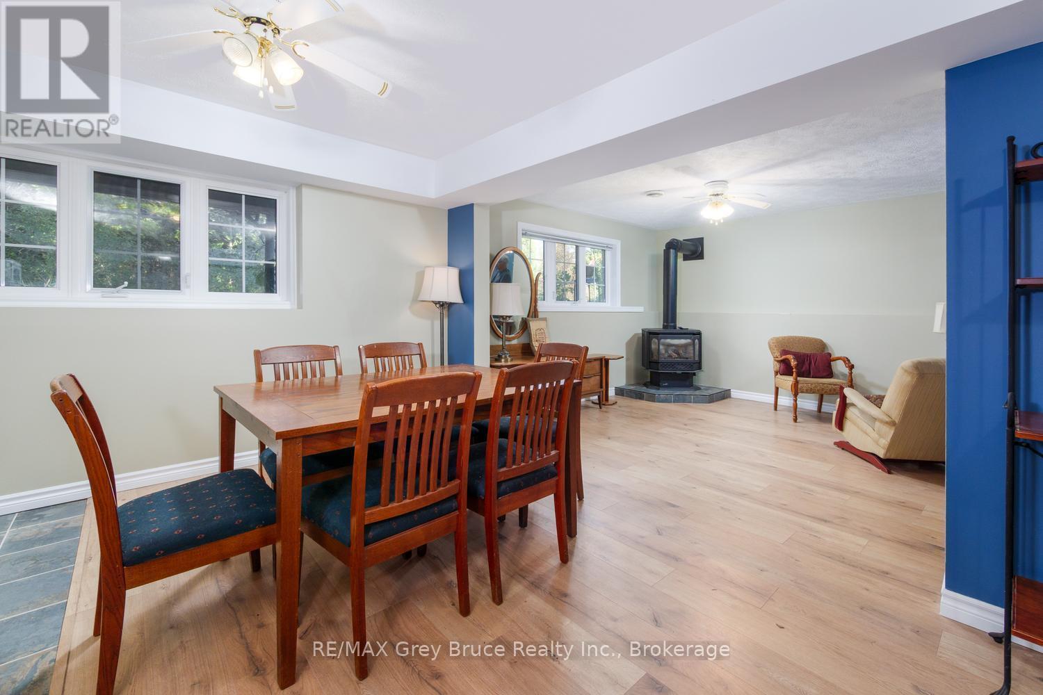 Open concept living space & propane fireplac - 135 North Diagonal, South Bruce Peninsula, ON