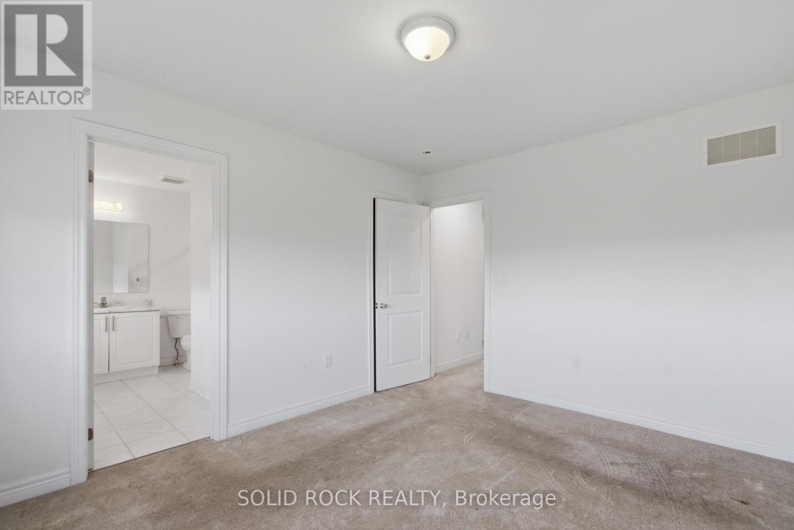 Primary Bedroom Into Ensuite - 37 Summer Breeze Drive, Quinte West (Murray Ward), ON