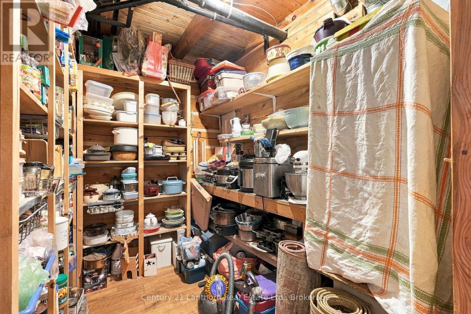 Large walk-in pantry next to kitchen - 939 Kelly Road, Prince Edward County (Athol Ward), ON