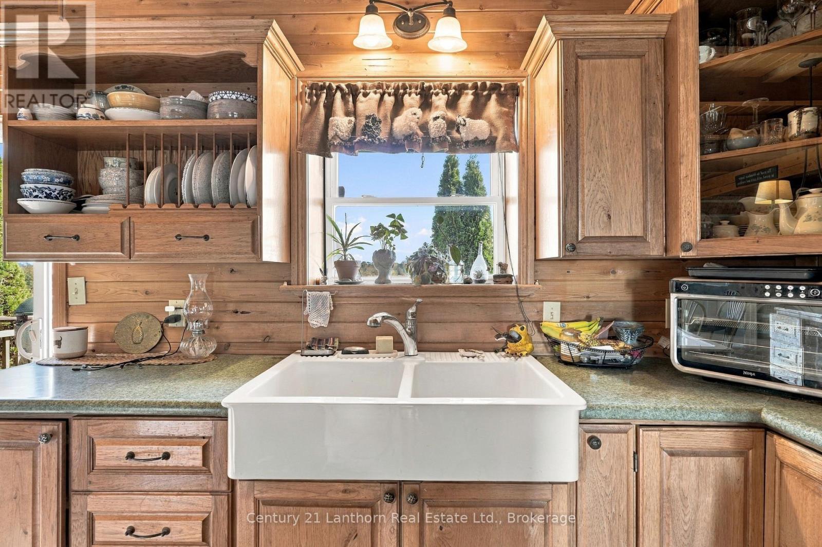 Farmhouse kitchen sink - 939 Kelly Road, Prince Edward County (Athol Ward), ON