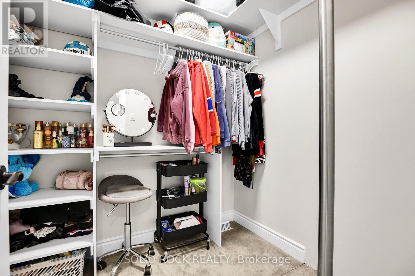 Walk in Closet with Fire Poll to Family Room - 7040 Donwel Drive, Ottawa, ON