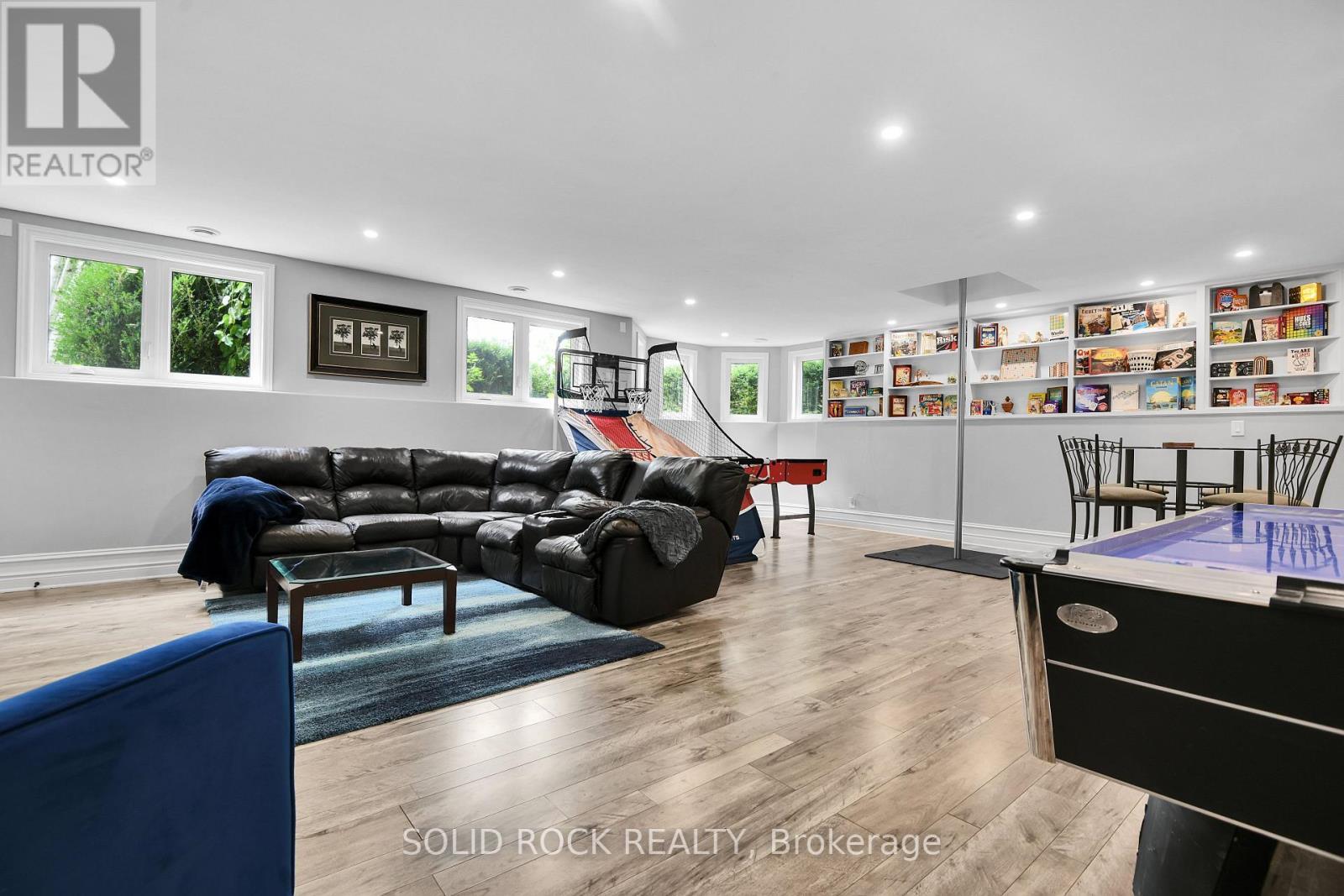 Family Room with Fire Poll - 7040 Donwel Drive, Ottawa, ON