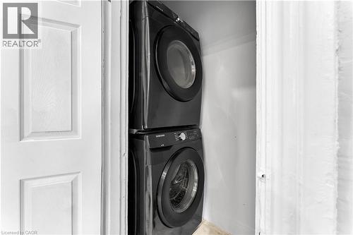 Laundry closet with a stackable washer and dryer - 101 Emerald Street N, Hamilton, ON 