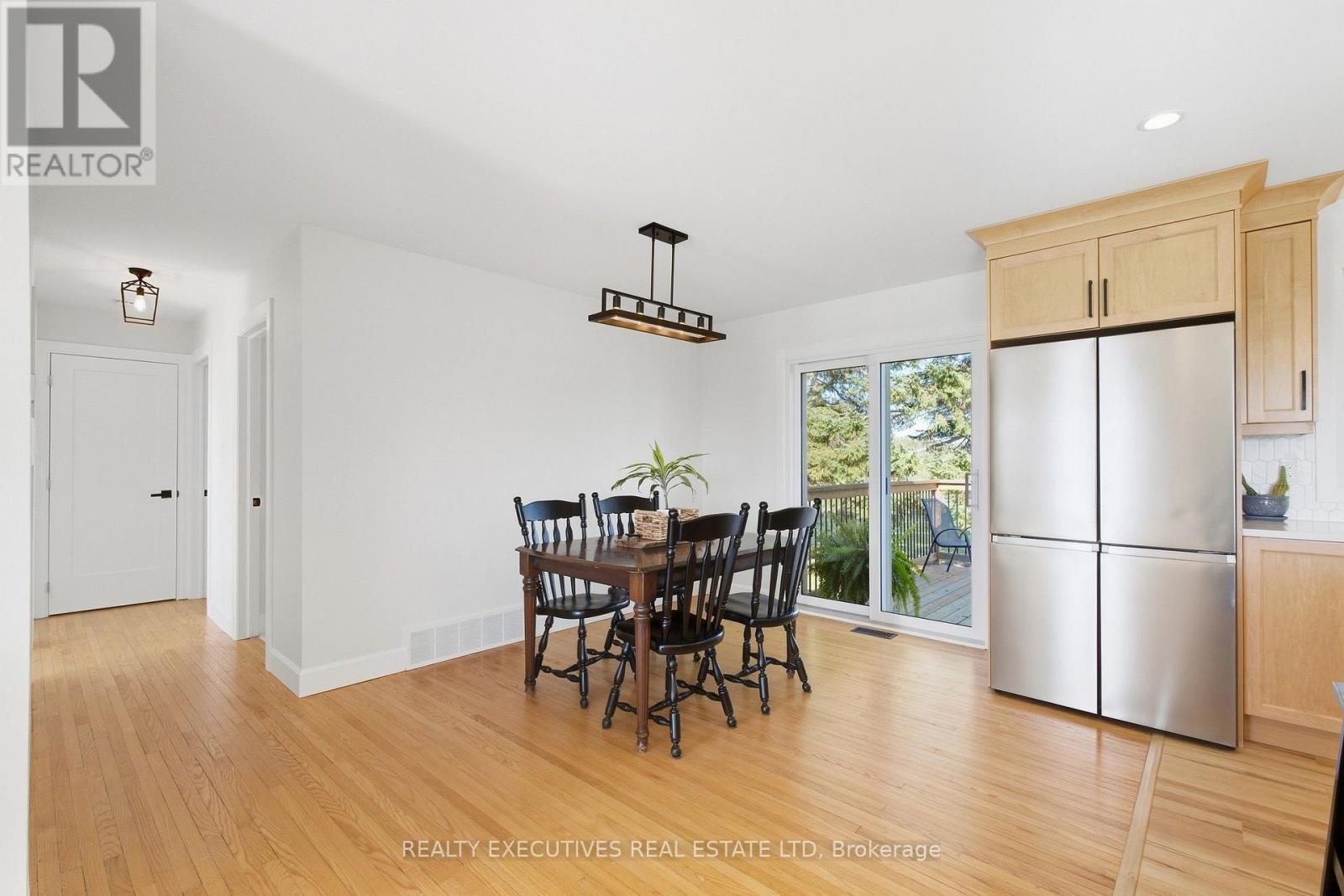 Patio doors to deck from Dining - 11895 Cloverdale Road, North Dundas, ON