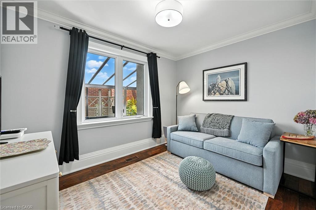 Hardwood flooring, crown molding, white trim, recessed lighting, and a double window - 2209 Ghent Avenue, Burlington, ON