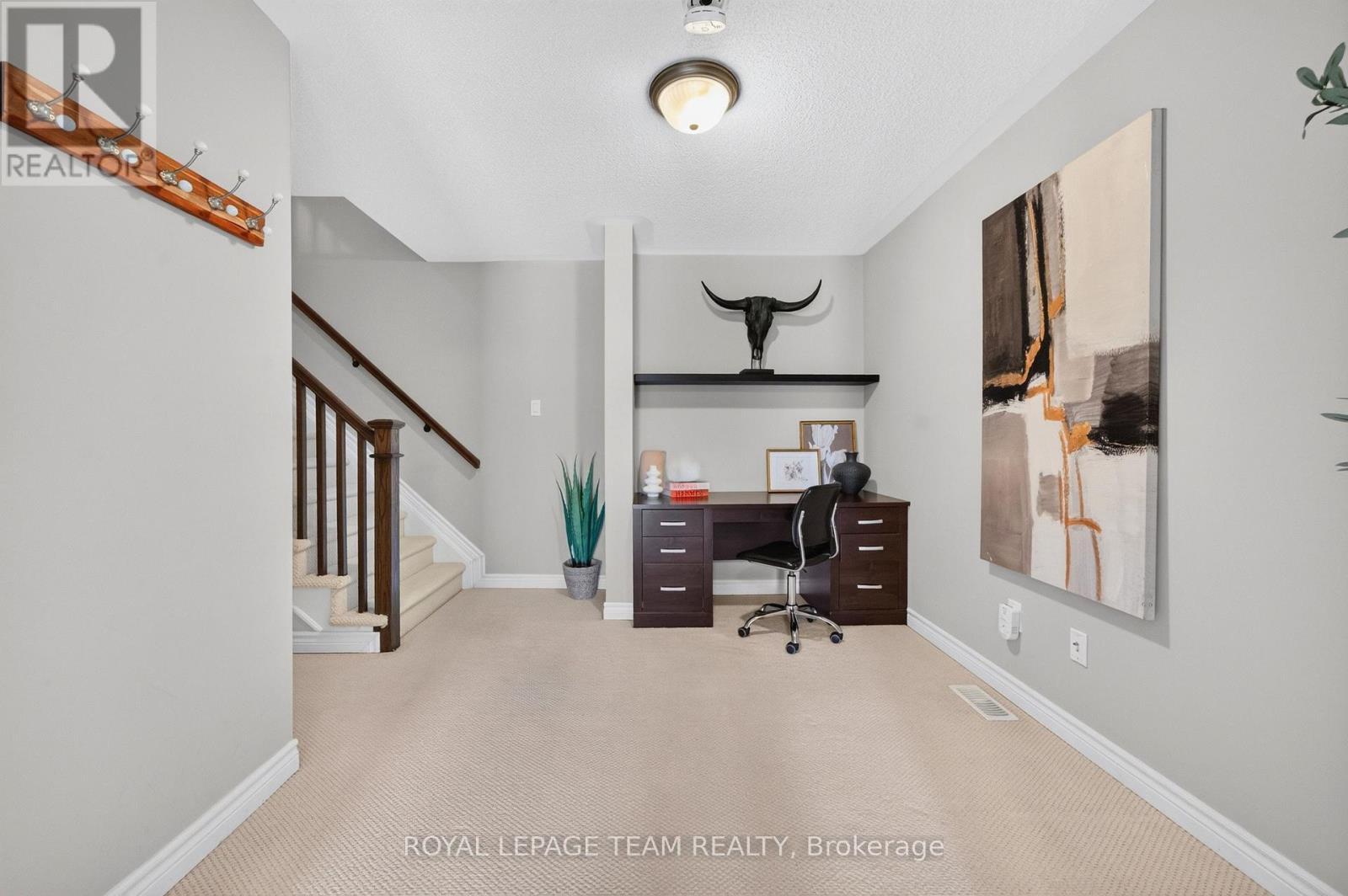 The den space on the main w/built in desk - 246 Leather Leaf Terrace, Ottawa, ON