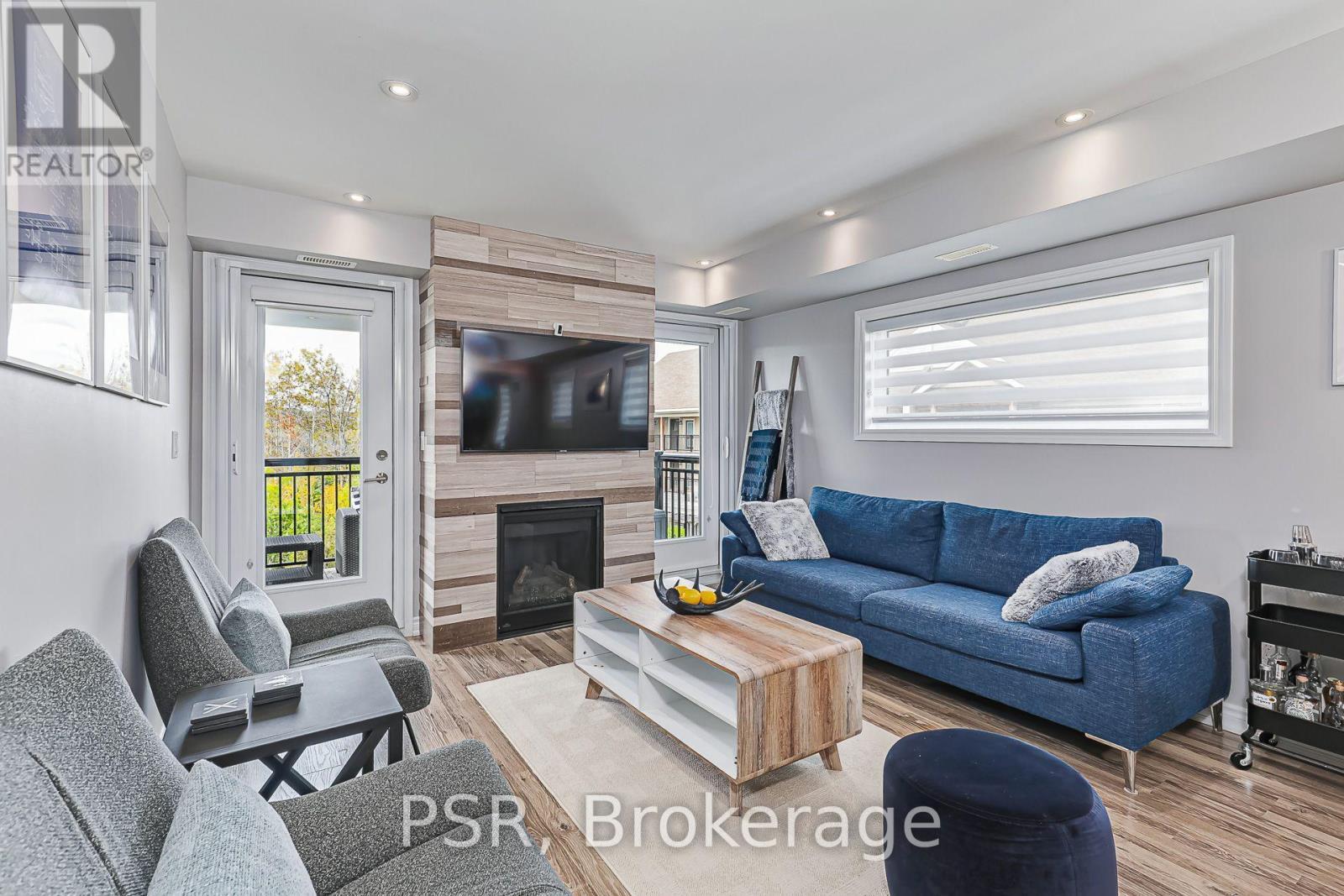 Living Room Leading to Balcony - 308 - 4 Anchorage Crescent, Collingwood, ON