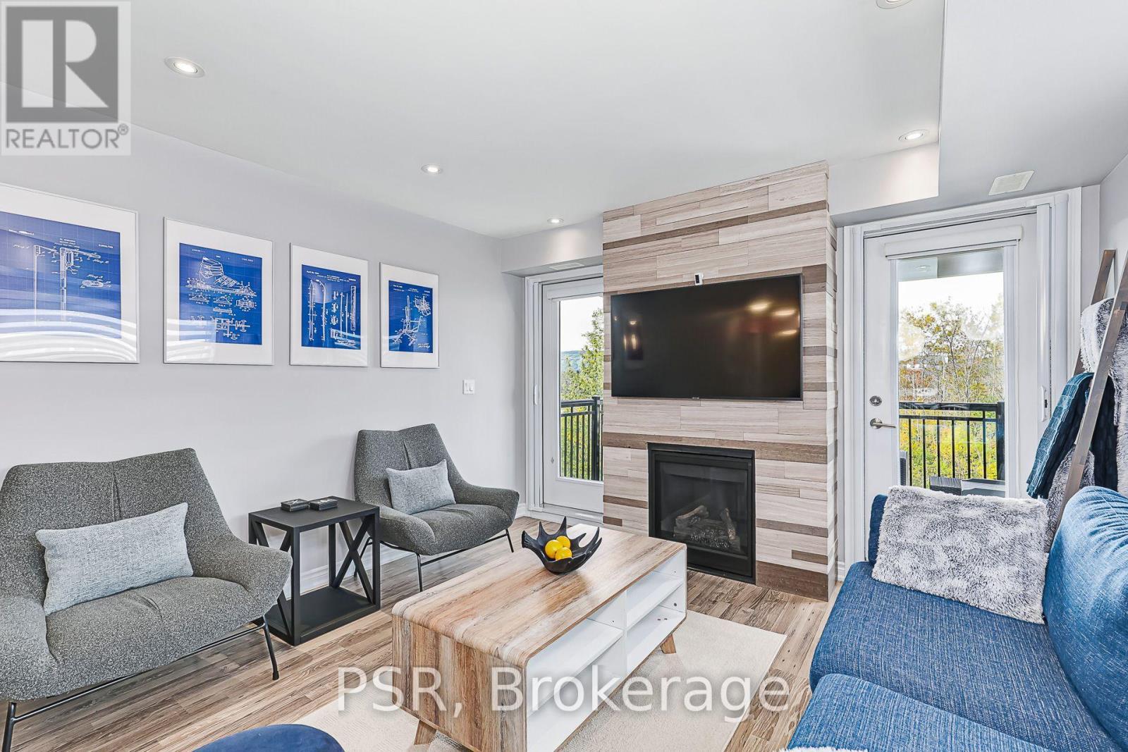 Living Area & Fireplace - 308 - 4 Anchorage Crescent, Collingwood, ON