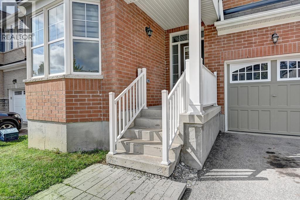 Brick exterior with a prominent bay window - 236 Ridge Road, Cambridge, ON