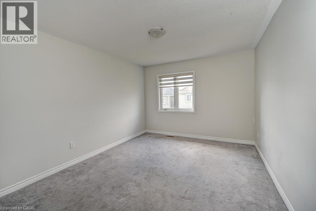 Soft gray carpeting with white baseboards - 236 Ridge Road, Cambridge, ON