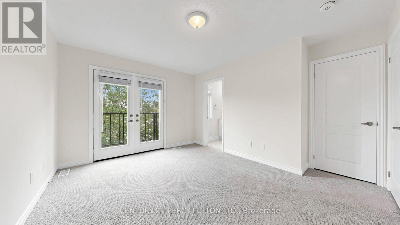 Upper Floor Primary Bedroom Leading to Balcony - 64 Ferris Square, Clarington, ON