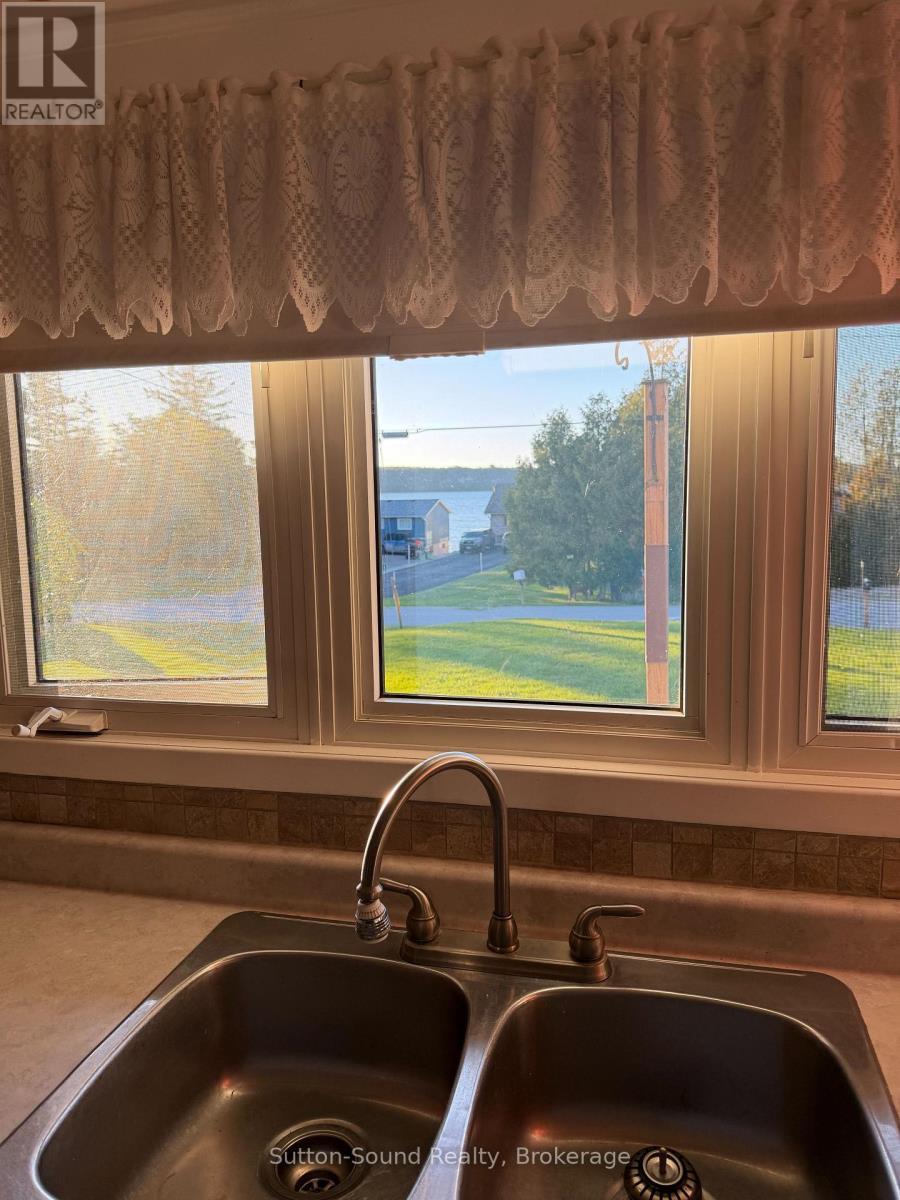 water view from the kitchen - 108 Wilson Drive, Georgian Bluffs, ON