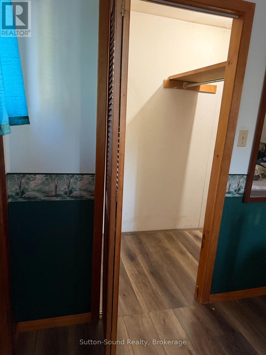 walk through double closet - 108 Wilson Drive, Georgian Bluffs, ON