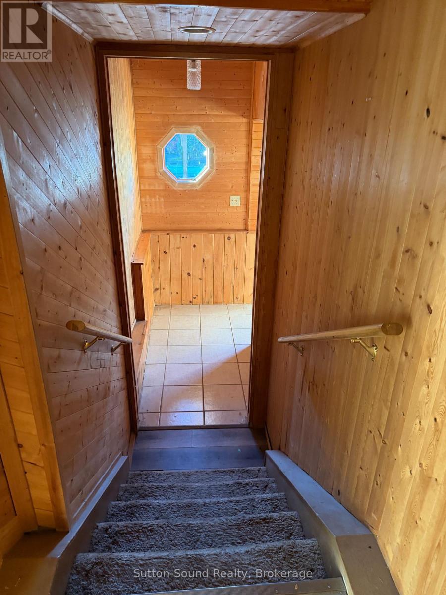 down to the family room - 108 Wilson Drive, Georgian Bluffs, ON