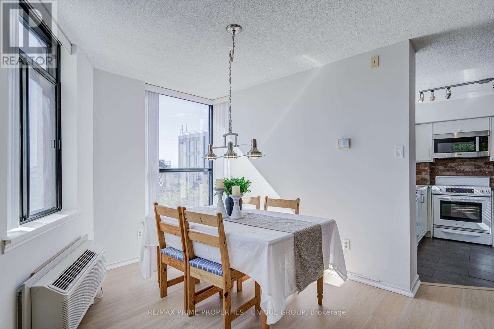 Dining room with south views towards lake. - 301 - 250 Queens Quay W, Toronto, ON