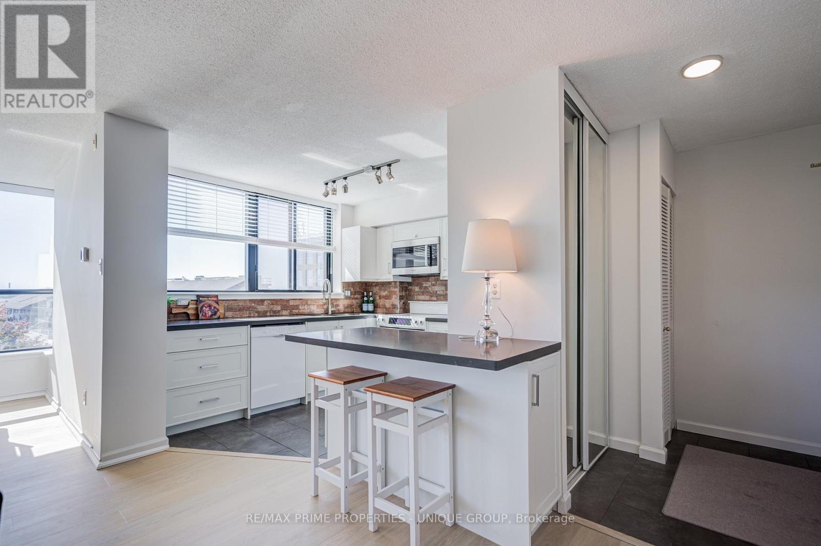 Modern kitchen with south views of lake. - 301 - 250 Queens Quay W, Toronto, ON