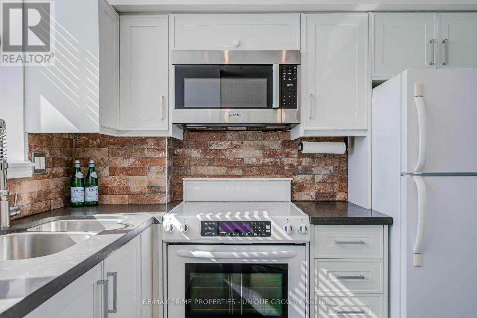 Modern kitchen with double sink. - 301 - 250 Queens Quay W, Toronto, ON