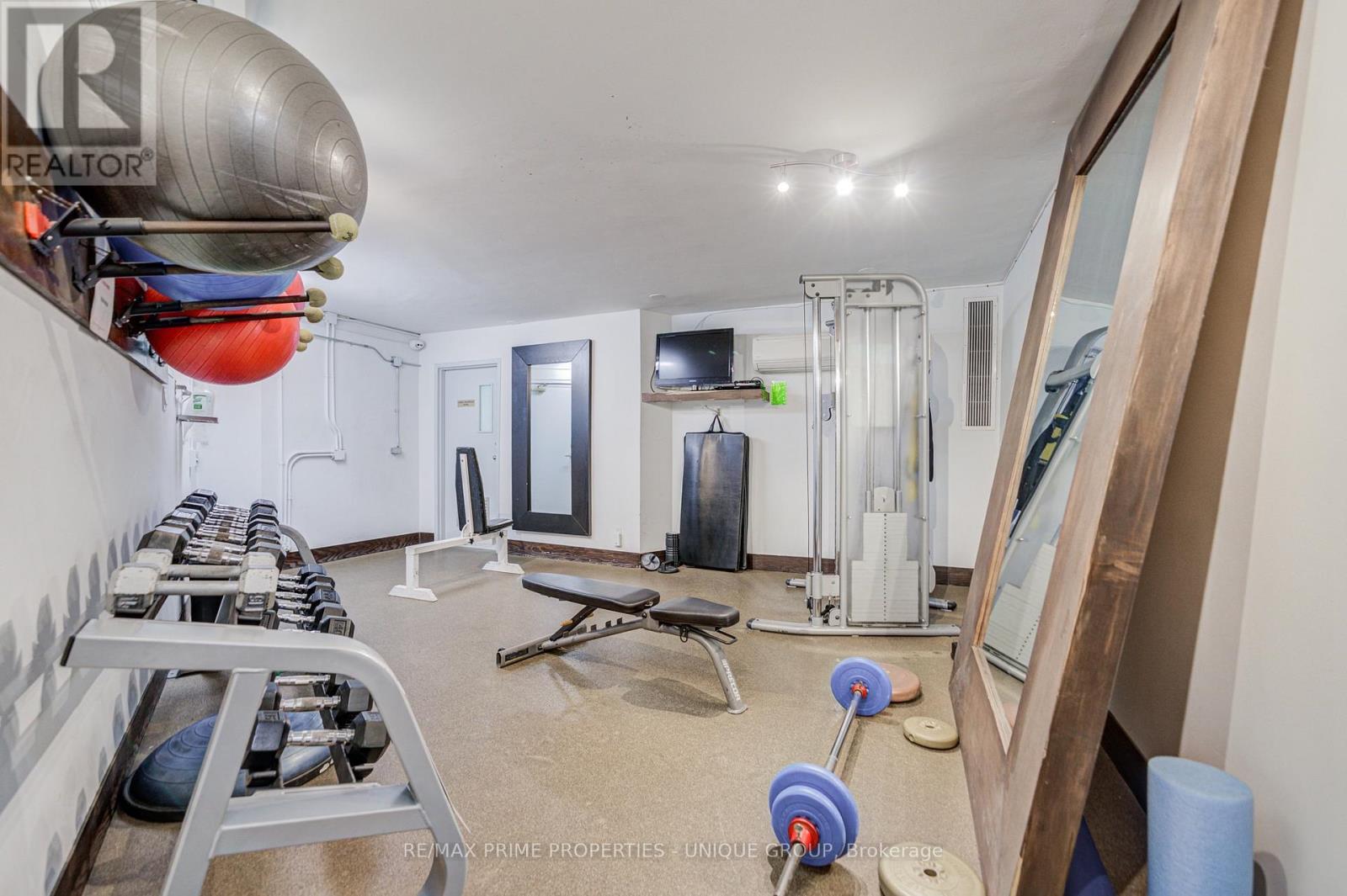 Gym with free weights and universal. - 301 - 250 Queens Quay W, Toronto, ON