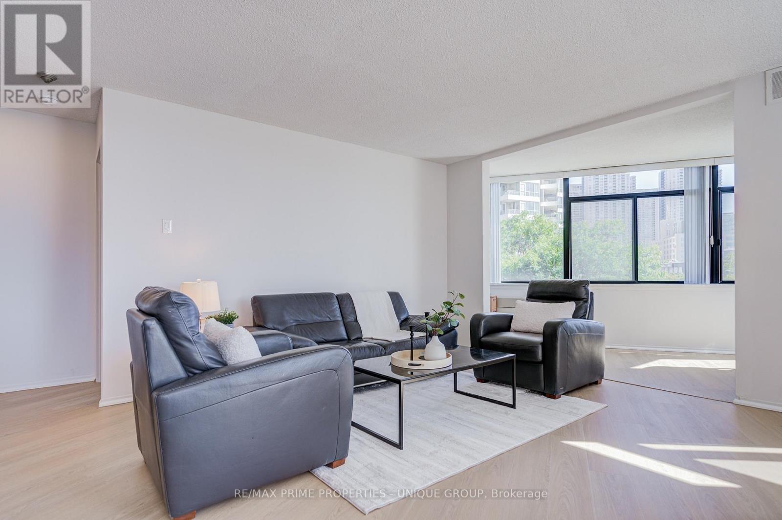 Living room with luxury vinyl plank floors. - 301 - 250 Queens Quay W, Toronto, ON