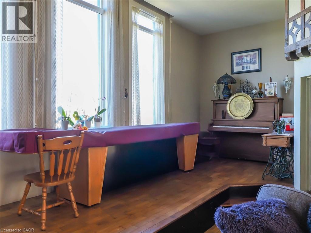 Living area - old stage from schoolhouse- storage underneath - 1635 Lakeshore Road, Clear Creek, ON
